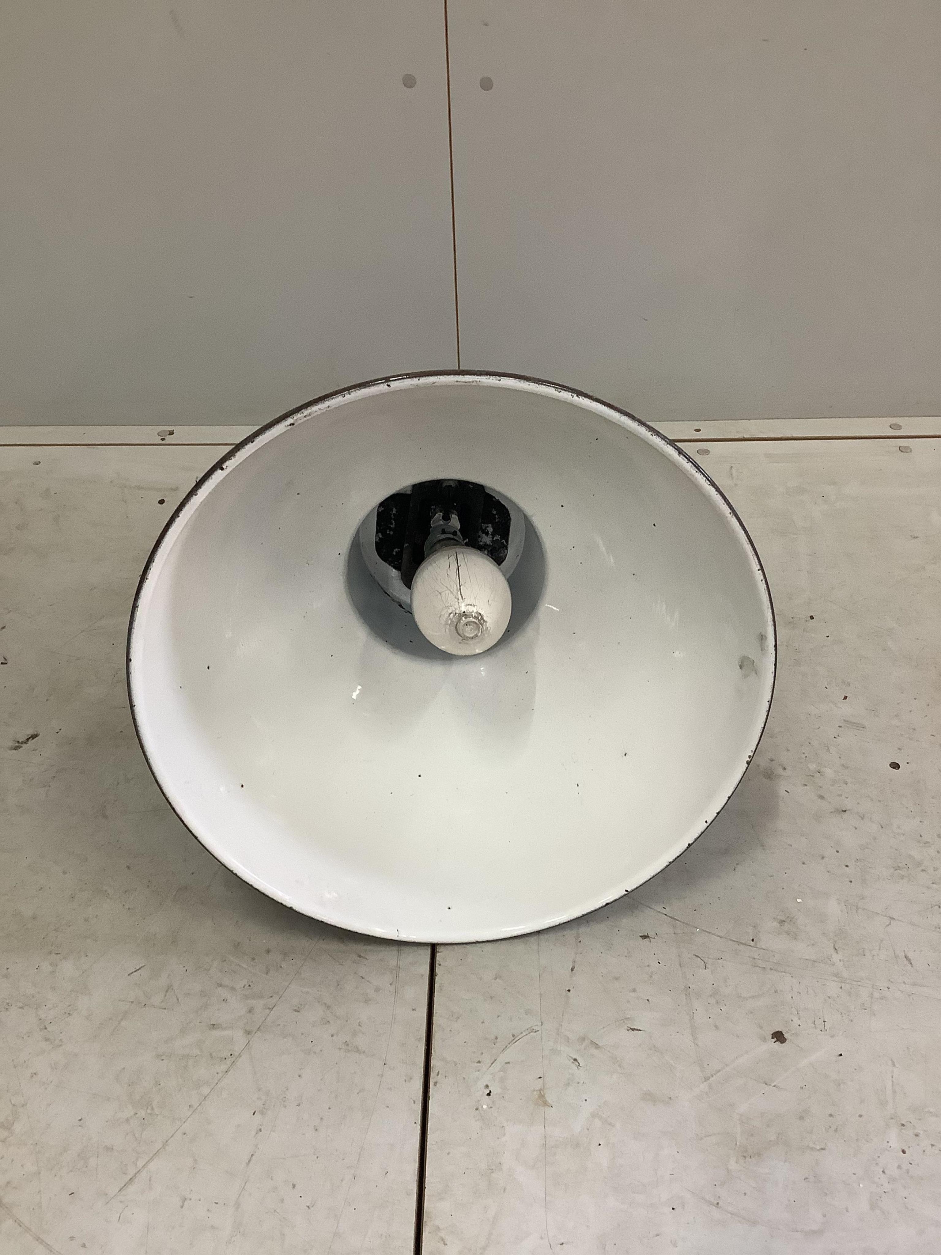 A set of four mid century Mazda industrial ceiling lights, height 68cm, diameter 50cm and one other light. Condition - fair to good, will need re-wiring